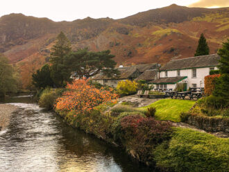 A cottage along the waters edge in the Lake District, Cumbria, England