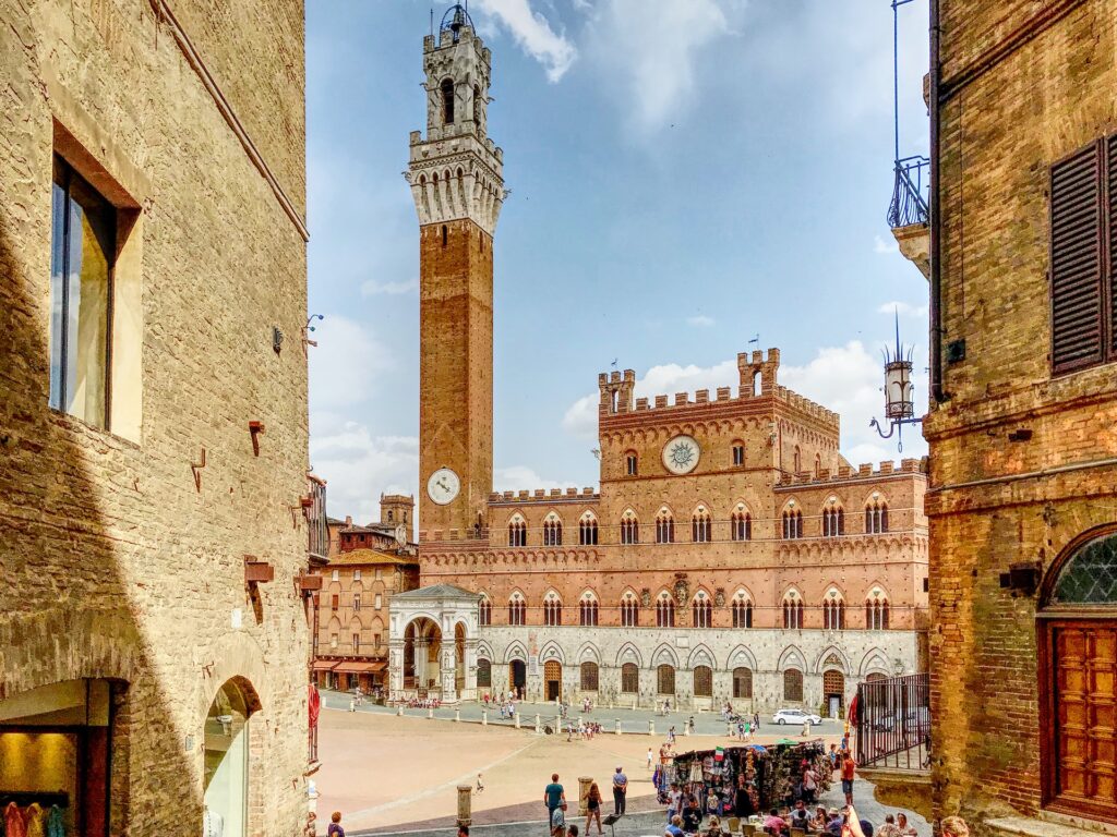 A view of the Piazza del Campo and the tower in the centre of Siena, Tuscany, italy, famed for its twice yearly horse race.