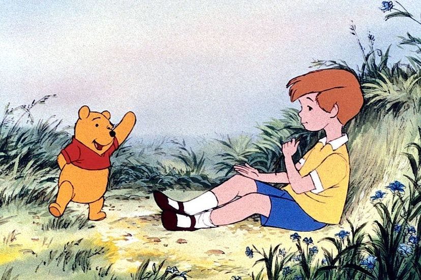 Winnie the Pooh and Christopher Robin, A.A. Milne's loveable main characters. Along with friends Eeyore and Piglet