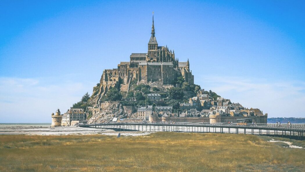 Mont Saint Michel in Normandy, Northern France, is a tidal island and home to a small commune of people.