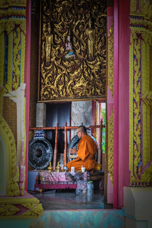 Wat Tham Sua, Wat Tham Khao Noi, temple, temples, thai, thailand, kanchanaburi, attractions, where, to, go, what, see, near, travelling, around, backpacking, best, places, top, unusual, unique travel, travelling book junkie, travel, exploring, staying, interesting, chinese, photography, photo, picture, monk, blessing, praying,