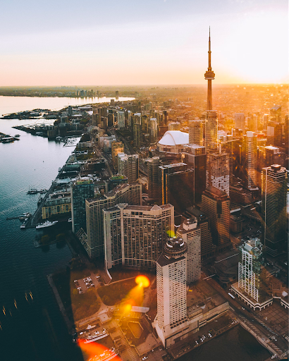 The skyline of a Canadian city as the sun goes down
